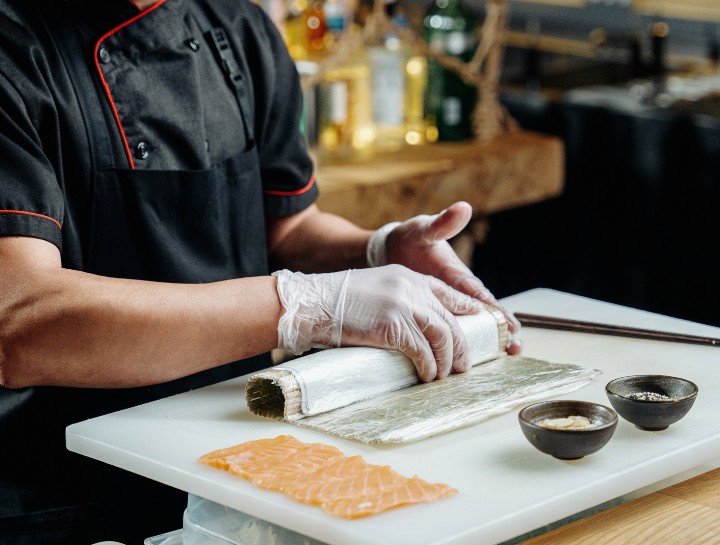 Assortment of essential sushi tools and utensils, including bamboo sushi mats, Japanese sushi knives and more